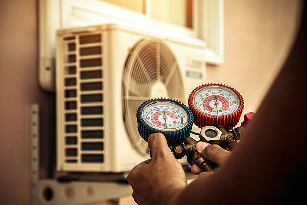 Professional Ac Installation technician working in Woodstock, GA